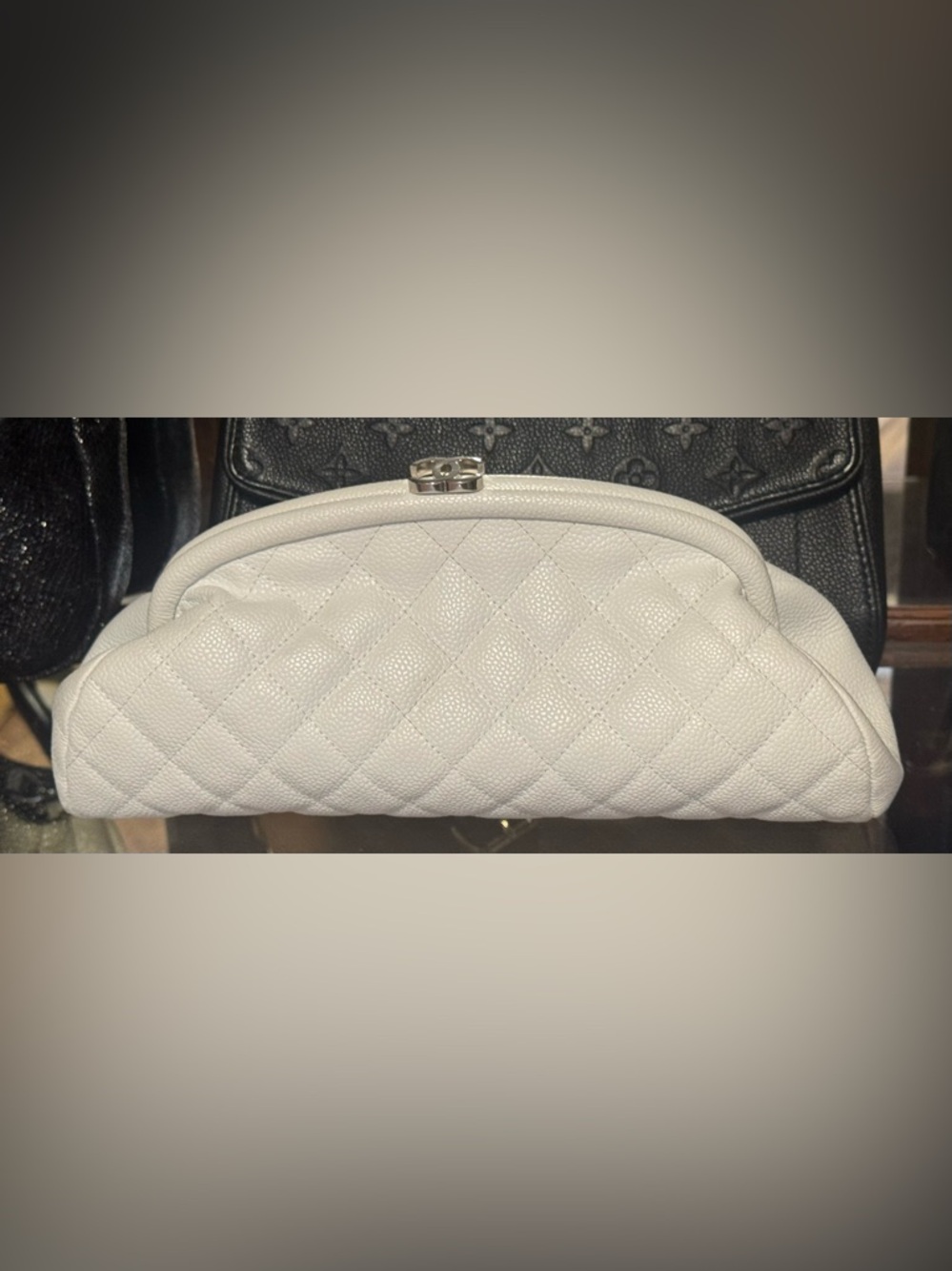 CHANEL White Quilted Clutch with Silver Accent